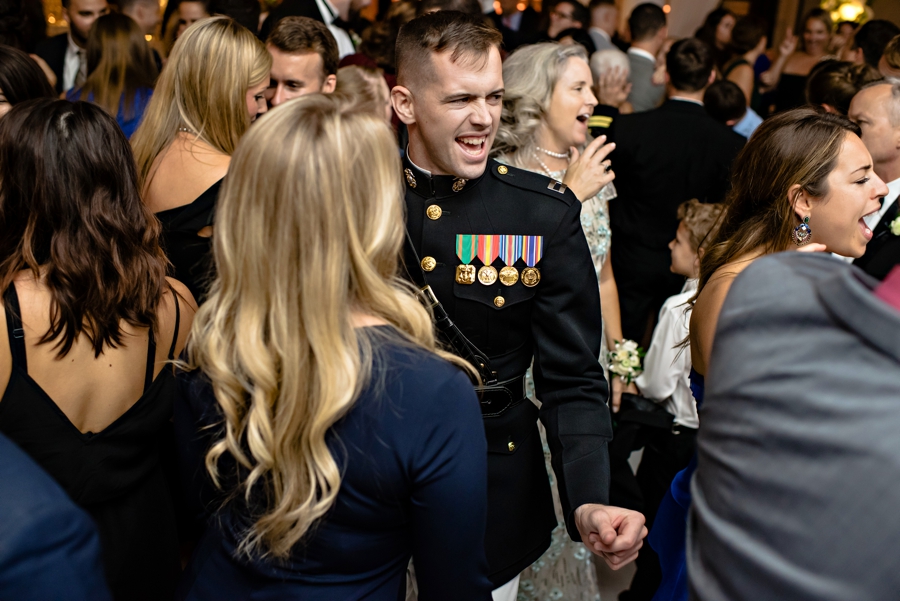 A Navy officer dancing during the wedding reception at Vie.